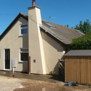 Bungalow after monocouche render applied