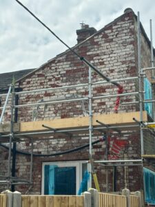Exposed Brick After Removing Sand and Cement Render